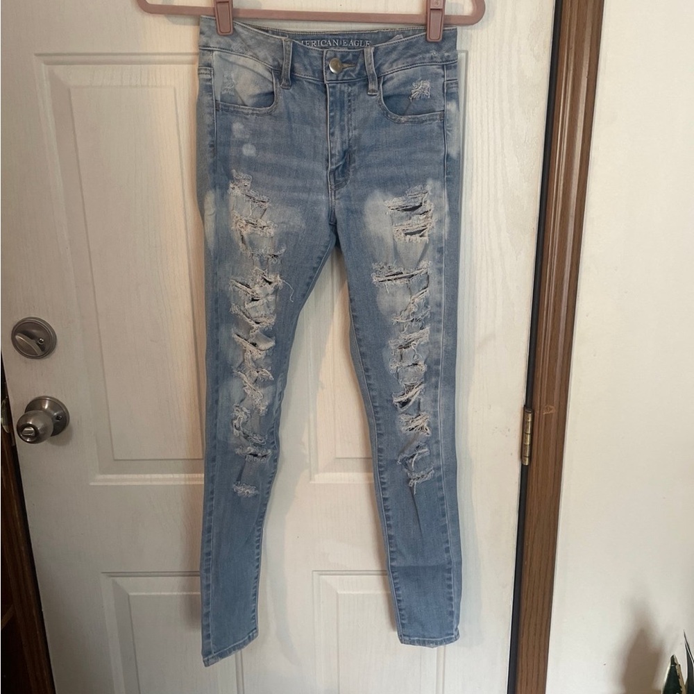 American Eagle Sz 2 hi rise super stretch Light Blue Distressed Jeans